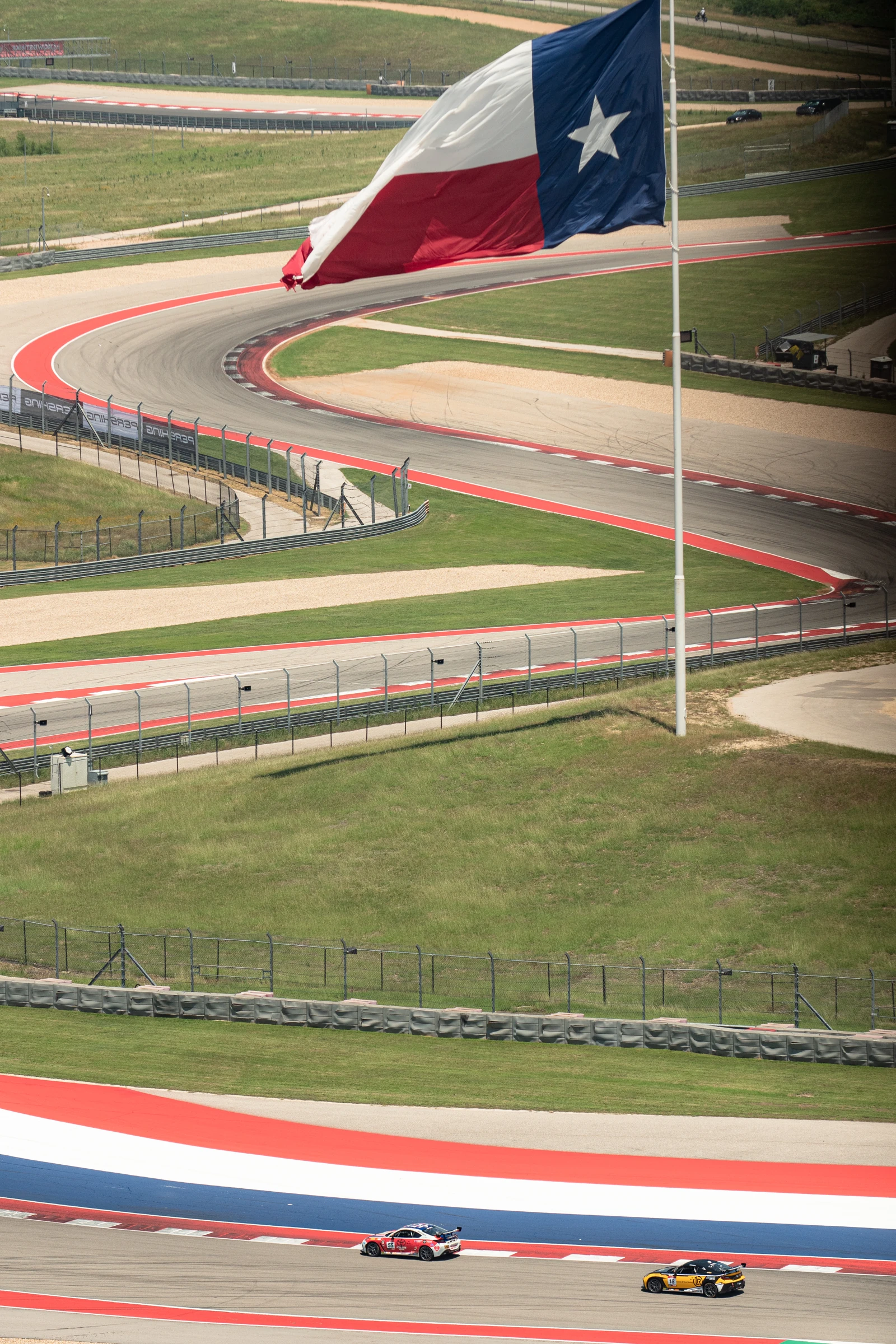 Texas flag overlooking the racing circuit
